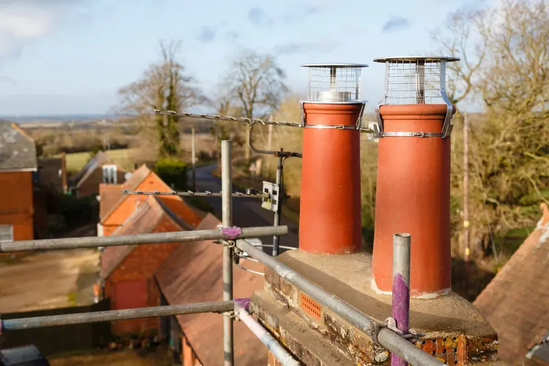 Chimney pots and scaffolding during a chimney repair in Harrogate